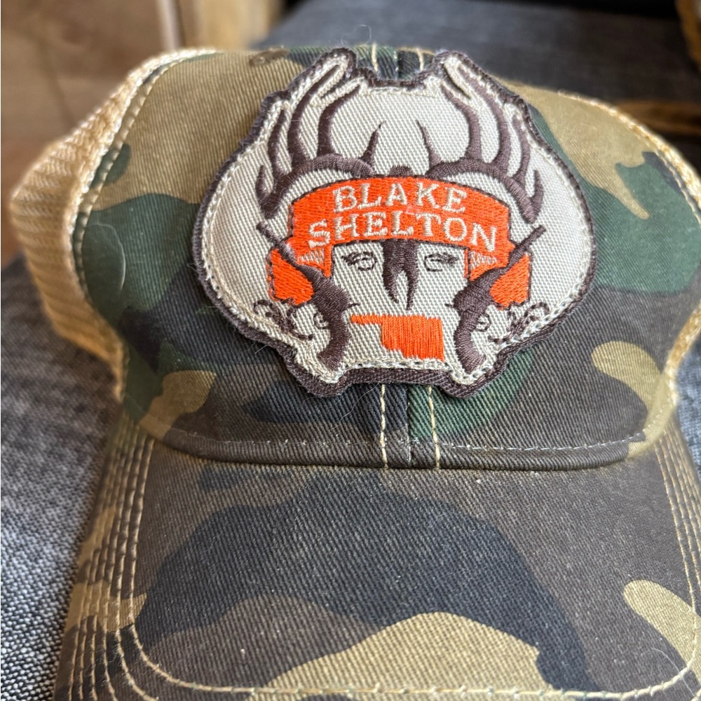 Legacy Camo Trucker Hat with Orange Patch